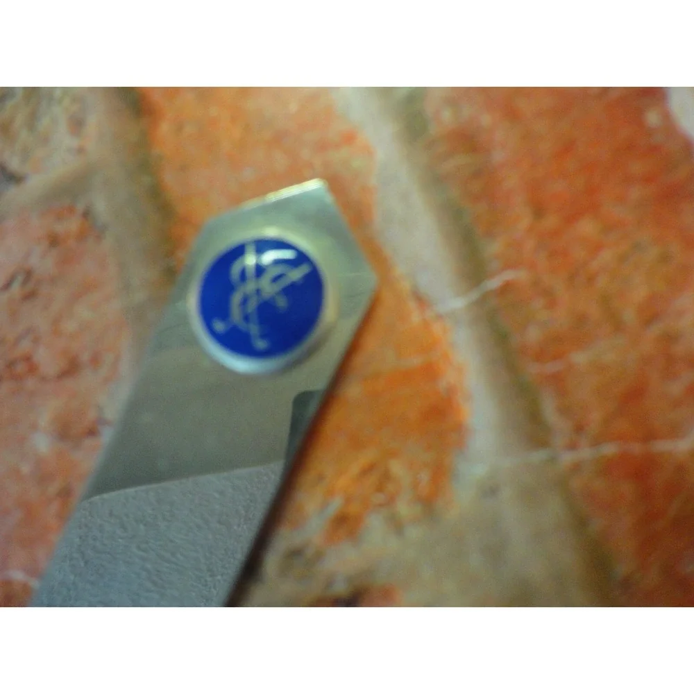 Italy stamped letter opener with CCC and golf clubs symbol estate find